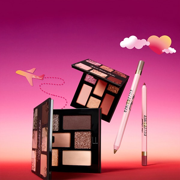 productos de maquillaje y corazones rosas